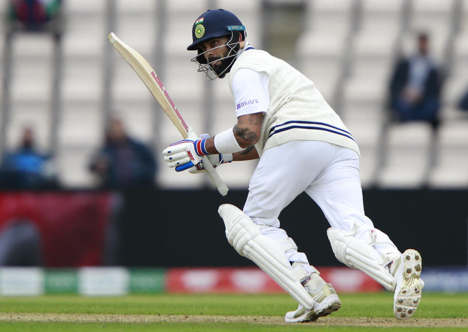 India's captain Virat Kohli watches the ball after playing a shot during the second day of the World Test Championship final cricket match between New Zealand and India, at the Rose Bowl in Southampton, England, Saturday, June 19, 2021. (AP Photo/Ian Walton)