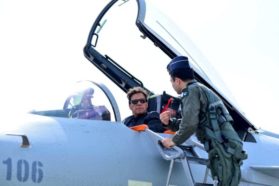 Image: Pakistan's Prime Minister Imran Khan sits in the cockpit of the Chinese J-10 C combat aircraft during the induction ceremony in Kamra (Pakistani Prime Minister's Office / Reuters)