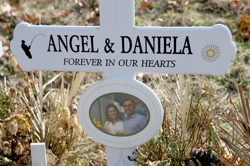 A roadside memorial to Angel Acevedo and Daniela Correia Salles of Baltimore is shown along Asbury Avenue, just east of the Parkway in Tinton Falls Friday, March 18, 2022.  The Monmouth County Prosecutor has charged off duty Hillside Police Officer John P. McClave III of Toms River with being criminally responsible for their deaths in an October 2021 crash that occurred there.