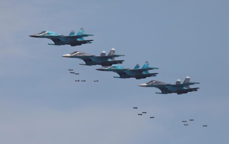 Sukhoi Su-34 bombers drop bombs during the Aviadarts competition as part of the 2018 International Army Games at the Dubrovichi area outside Ryazan, Russia, August 4, 2018.