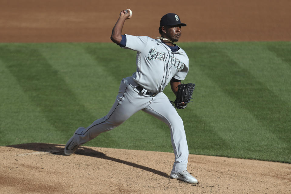 Seattle Mariners' Justin Dunn pitches against the Oakland Athletics during the first inning of the second baseball game of a doubleheader in Oakland, Calif., Saturday, Sept. 26, 2020. (AP Photo/Jed Jacobsohn)