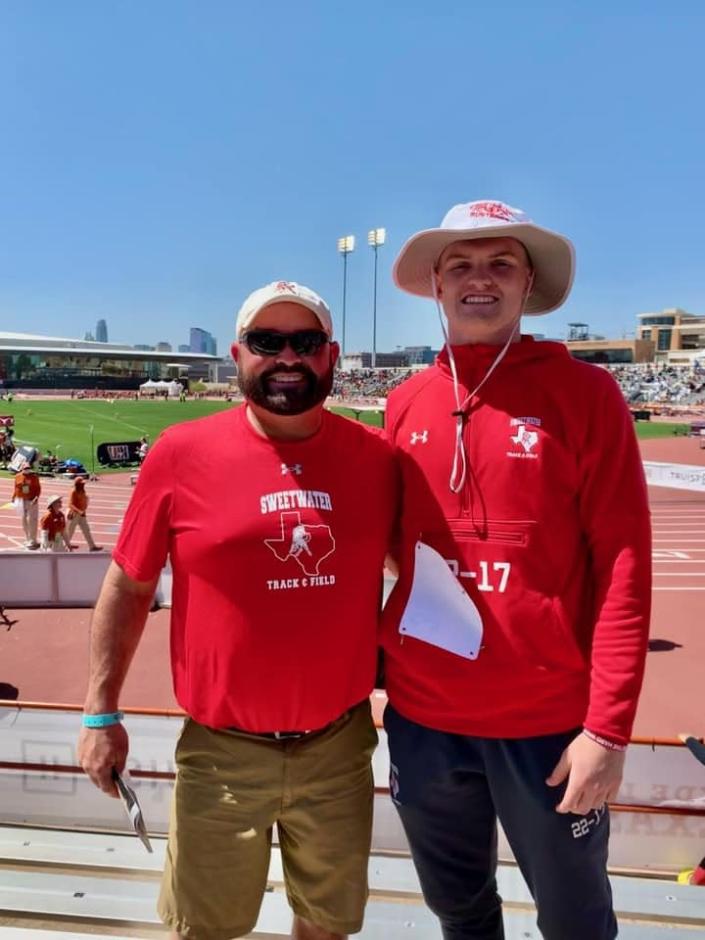 Sweetwater&#39;s Harrison Foster (right) poses with track coach Brian Hodnett at the Texas Clyde Littlefield Relays on March 26.