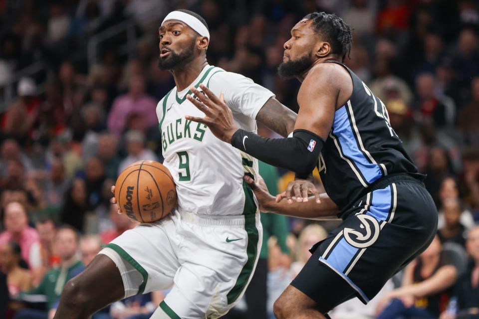 Bucks forward Bobby Portis drives on Hawks forward Bruno Fernando in the first quarter.