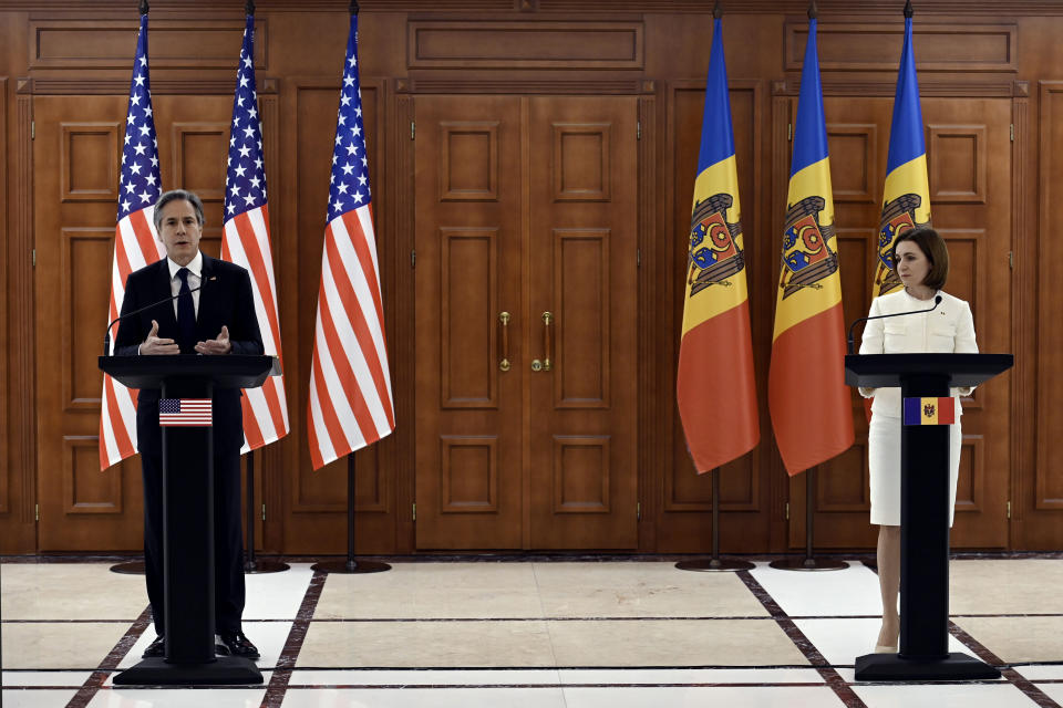 U.S. Secretary of State Antony Blinken, left. and Moldova's President Maia Sandu take part in a joint news conference following their talks in Chisinau, Moldova, Sunday, March 6, 2022. Blinken is in Moldova pledging America’s support to the small Western-leaning former Soviet republic that is coping with an influx of refugees from Ukraine and warily watching Russia’s intensifying war with its neighbor. (Olivier Douliery/Pool Photo via AP)