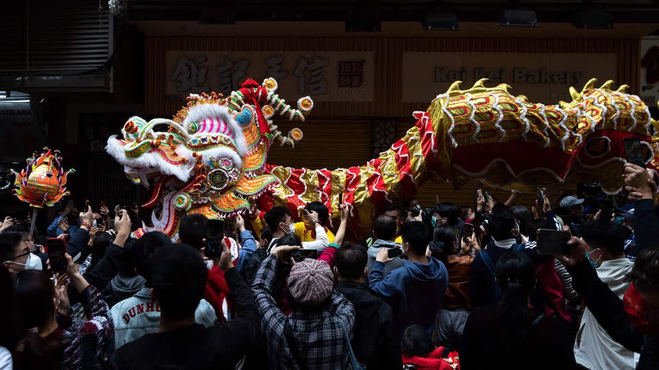 A 238 mter-long dragon dance is performed during celebrations on the first day of the Chinese lunar new year in Macau on January 22, 2023. - Eduardo Leal/AFP/Getty Images