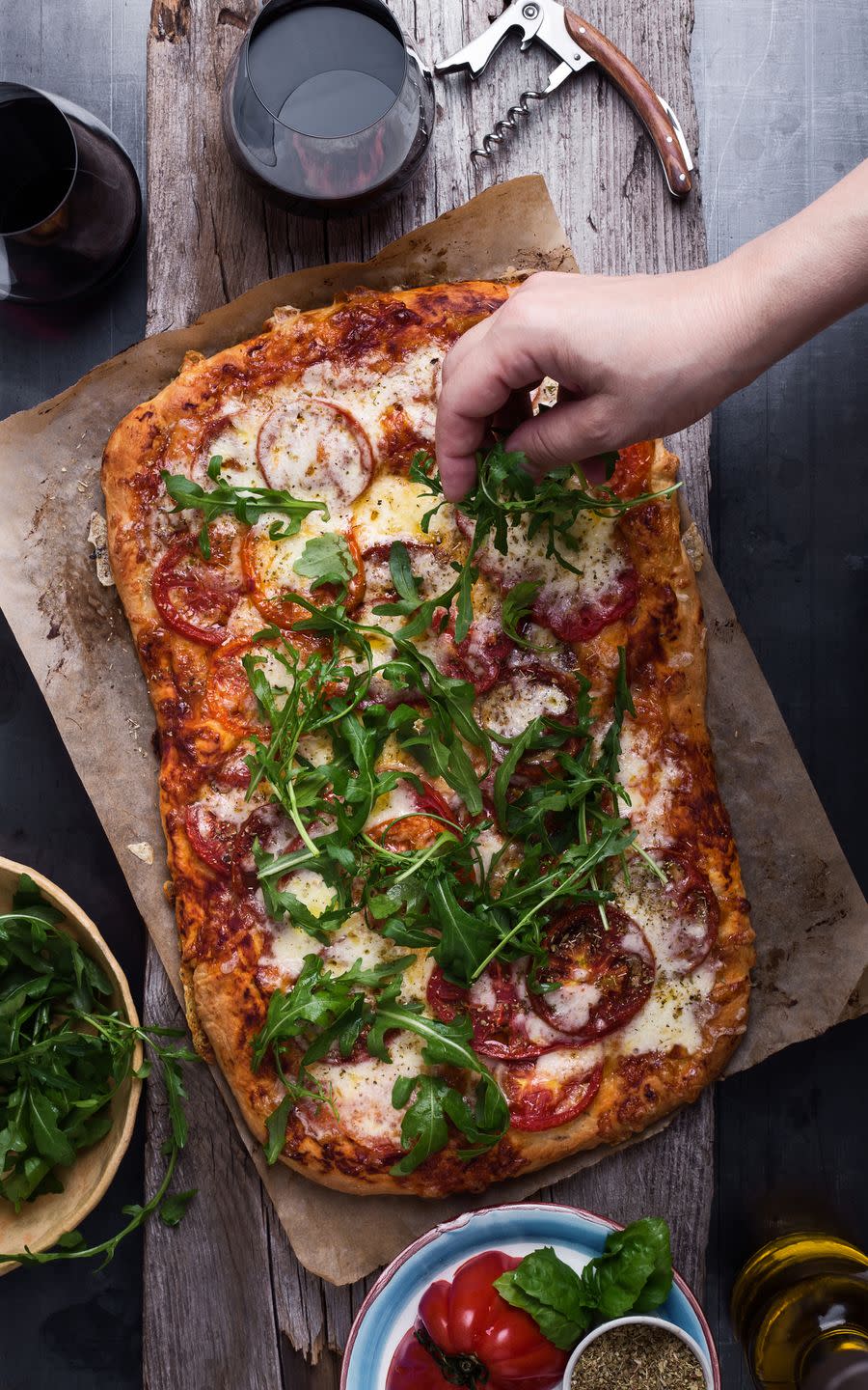<p>The best part about making your own pizzas is that you can go wild when it comes to toppings. No one can judge your Hawaiian pizza in the comfort of your home, right? Try this simple homemade <a href="https://www.countryliving.com/food-drinks/a27575518/pizza-dough-recipe/" rel="nofollow noopener" target="_blank" data-ylk="slk:pizza dough recipe;elm:context_link;itc:0;sec:content-canvas" class="link ">pizza dough recipe</a> for the perfect base.</p><p><a class="link " href="https://www.amazon.com/Unicook-Ceramic-Grilling-Resistant-Rectangular/dp/B06XGV3RS4/?tag=syn-yahoo-20&ascsubtag=%5Bartid%7C10050.g.30445302%5Bsrc%7Cyahoo-us" rel="nofollow noopener" target="_blank" data-ylk="slk:SHOP PIZZA STONES;elm:context_link;itc:0;sec:content-canvas">SHOP PIZZA STONES</a></p>
