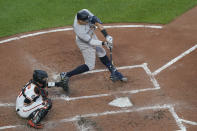 New York Yankees' Aaron Judge connects for a solo home run off Baltimore Orioles starting pitcher Spenser Watkins during the third inning of a baseball game, Tuesday, May 17, 2022, in Baltimore. (AP Photo/Julio Cortez)