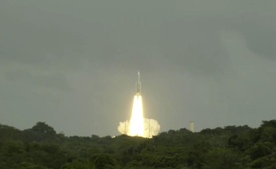 This photo provided by the European Space Agency shows an Ariane 5 rocket carrying the Jupiter Icy Moons Explorer, Juice, spacecraft lifting off from Europe's Spaceport in Kourou, French Guiana, Friday, April 14, 2023. (ESA via AP)