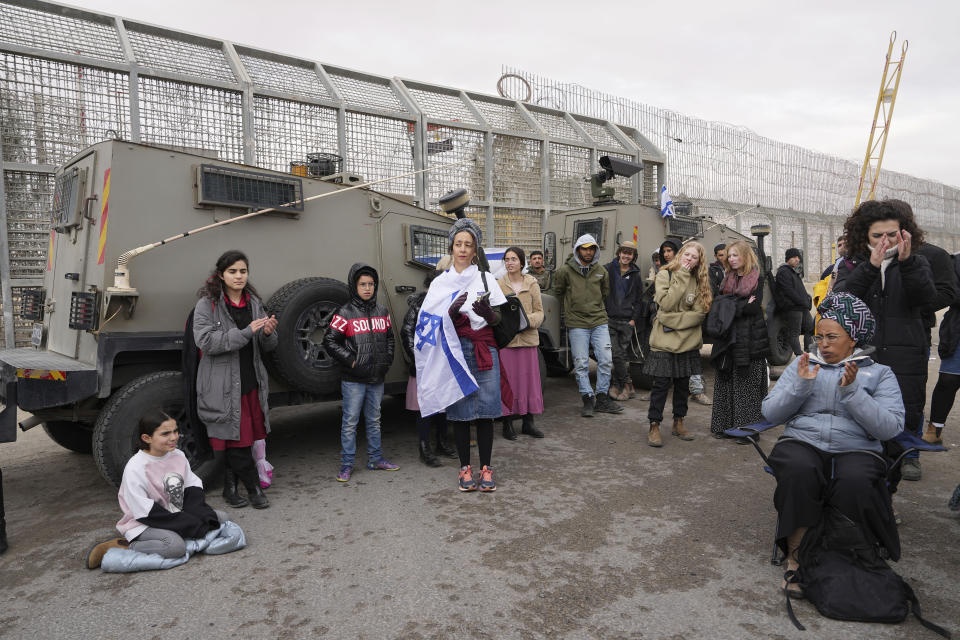 Protesters block the path for humanitarian aid bound for the Gaza Strip at the Nitzana border crossing with Egypt in southern Israel Friday, Feb. 2, 2024. (AP Photo/Tsafrir Abayov)