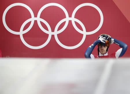 Skeleton – Pyeongchang 2018 Winter Olympics – Men’s Training – Olympic Sliding Centre - Pyeongchang, South Korea – February 14, 2018 - John Daly of the U.S. prepares to start. REUTERS/Arnd Wiegmann