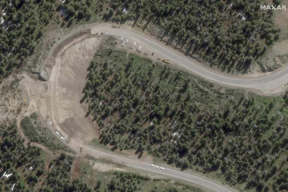 This satellite image released by Maxar Technologies a damaged section of Teton Pass near Jackson, Wyo., Tuesday, June 11, 2024. ((Satellite image ©2024 Maxar Technologies via AP)