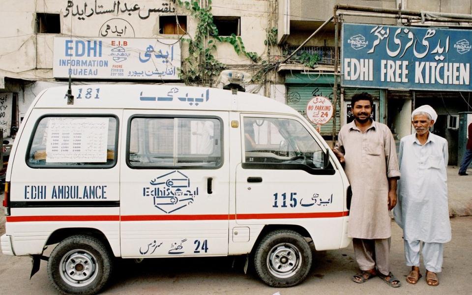 An Edhi Foundation ambulance outside the Edhi Free Kitchen. Photograph: Majority World/Getty Images - Credit: Getty Images