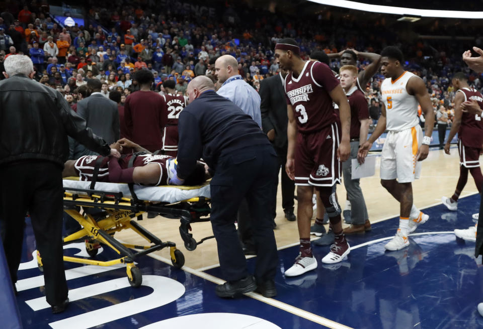 Mississippi State’s Nick Weatherspoon is taken off on a stretcher. (AP Photo/Jeff Roberson)