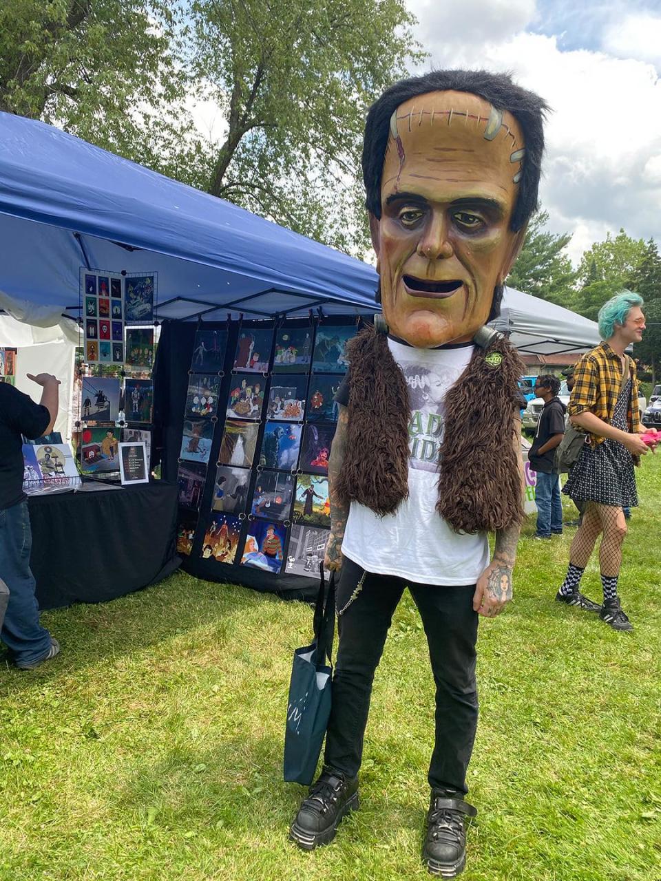 An attendee is decked out in Frankenstein gear for FrankenFest.
