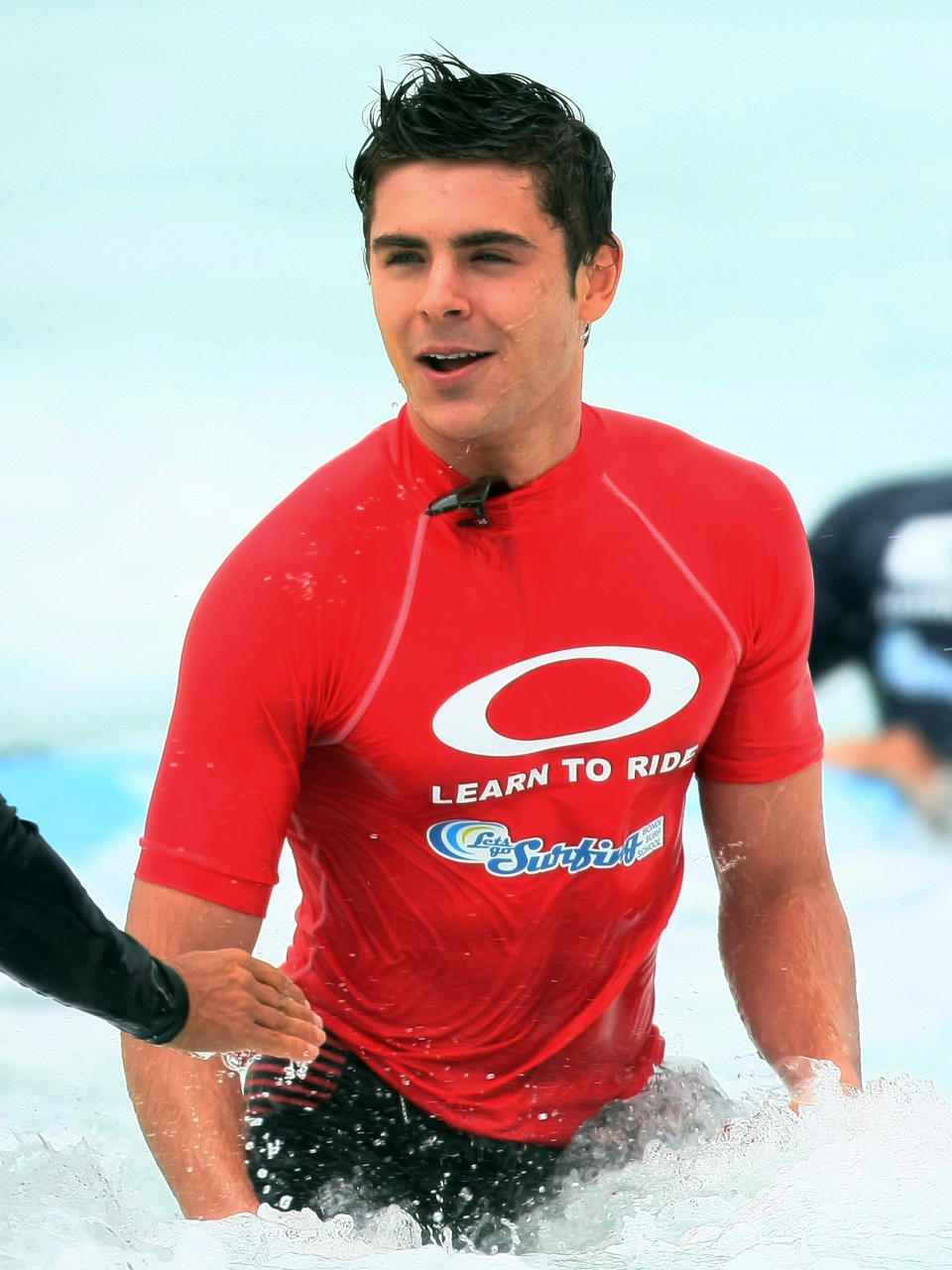 <p>This is Zac teaching people how to surf, or something.</p>