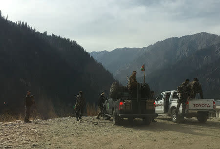 An Afghan security force personnel patrols near his check post in Parun, capital of Nuristan province, Afghanistan November 20, 2016. REUTERS/Hamid Shalizi