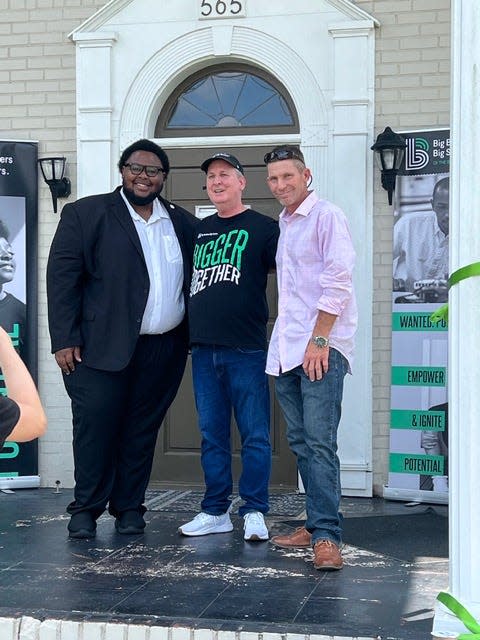 From left, Delaitre Hollinger, Brent Hartsfield, Jeffery Godwin at the Big Brothers Big Sisters building which was dedicated to Brent Hartsfield on Aug. 6, 2023.
