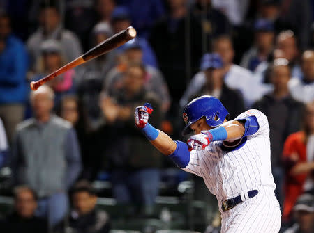 FILE PHOTO: Oct 17, 2017; Chicago, IL, USA; Chicago Cubs shortstop Addison Russell loses his grip on his bat in the ninth inning against the Los Angeles Dodgers during game three of the 2017 NLCS playoff baseball series at Wrigley Field. Mandatory Credit: Jim Young-USA TODAY Sports