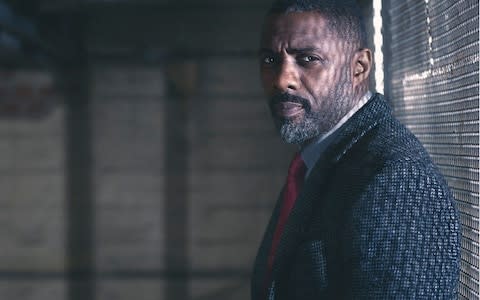 Idris Elba as the brooding detective Luther - Credit: BBC