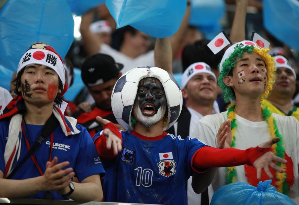 <p>Fans of Japan cheer for their team prior a group B match of the men’s Olympic football tournament between Japan and Colombia at the Amazonia Arena, in Manaus, Brazil, Sunday, Aug. 7, 2016. (AP Photo/Michael Dantas) </p>