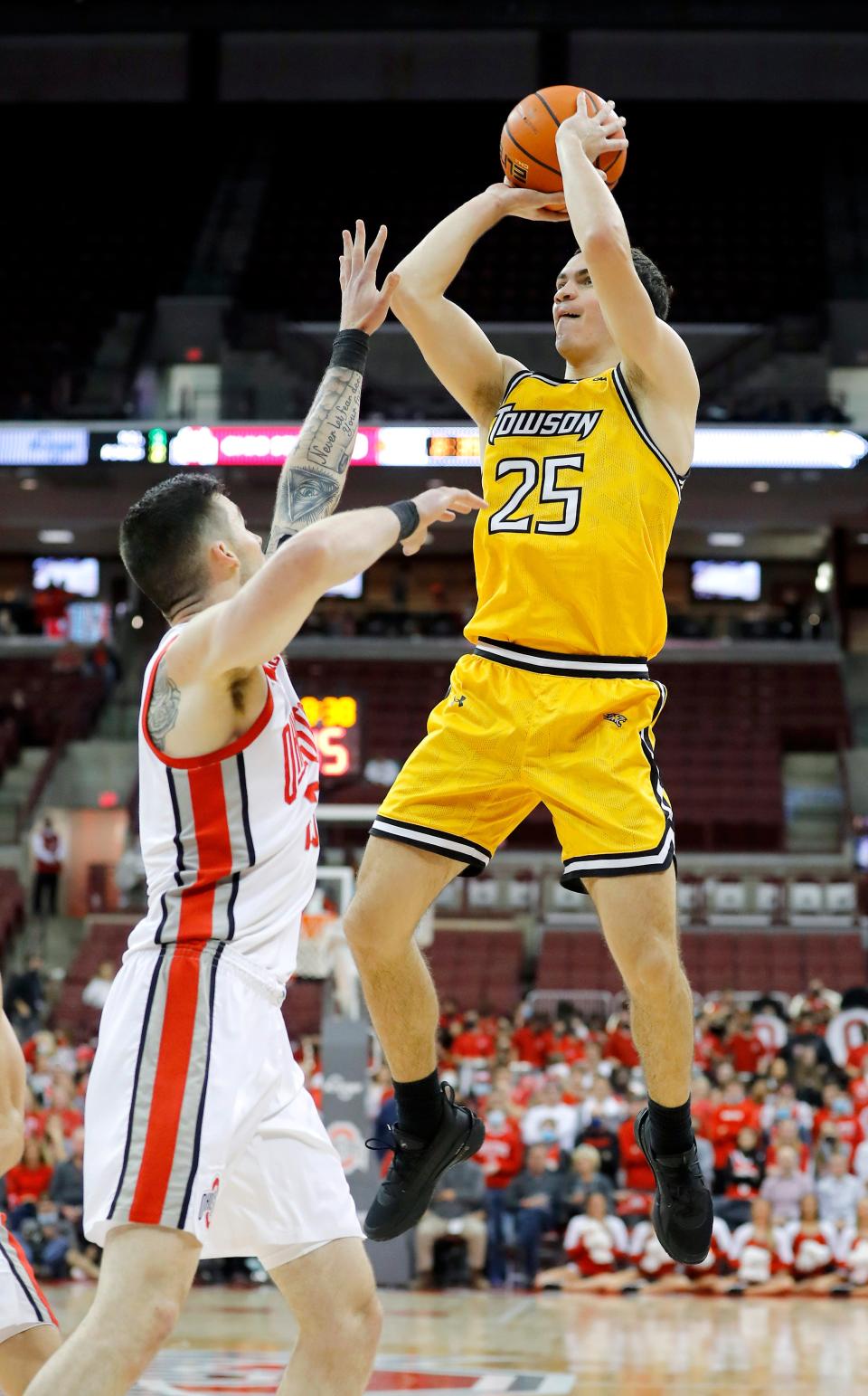 Then with Towson, Nicolas Timberlake takes a shot during a game on Dec. 8, 2021 against Ohio State at Value City Arena. Timberlake transferred to Kansas ahead of the 2023-24 season.