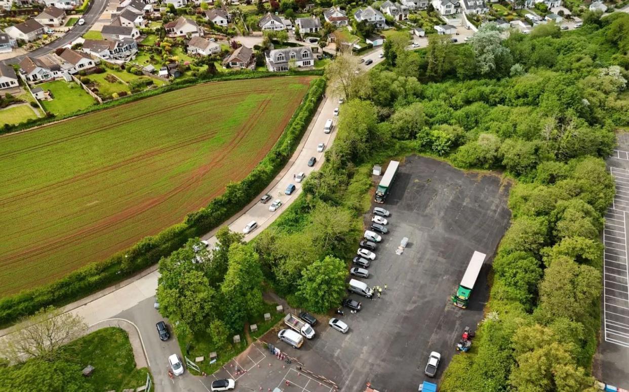 People in Paignton queue for almost a mile for water on Thursday