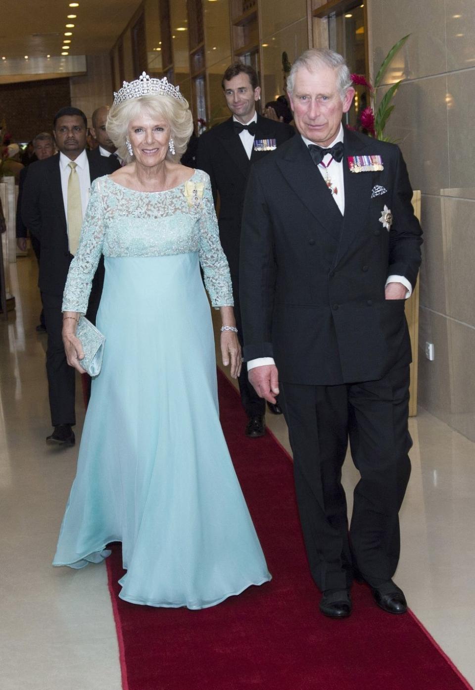 <p>Camilla wore a rick lace and chiffon gown in light blue along with a tiara for a welcome dinner for her and Prince Charles in Colombo, Sri Lanka. </p>