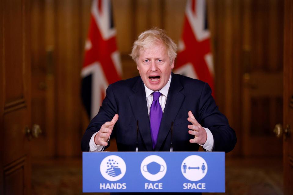 Britain's Prime Minister Boris Johnson speaks during a virtual press conference inside 10 Downing Street in central London on December 2, 2020. - Britain on Wednesday became the first western country to approve a Covid-19 vaccine for general use, while Italy and Japan promised free inoculations for all even as the global death toll ticked towards 1.5 million. A mere 12 months after the pandemic began in China, the UK's independent medicines regulator gave its green light to the BioNTech-Pfizer drug in double-quick time but insisted safety had come first. (Photo by JOHN SIBLEY / POOL / AFP) (Photo by JOHN SIBLEY/POOL/AFP via Getty Images)