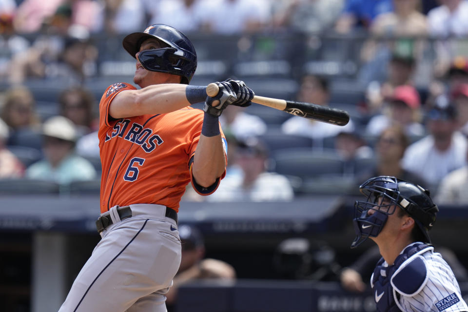 Houston Astros' Jake Meyers, left, watches his three-run home run during the second inning of a baseball game against the New York Yankees at Yankee Stadium, Sunday, Aug. 6, 2023, in New York. (AP Photo/Seth Wenig)