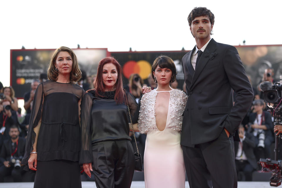 FILE - Director Sofia Coppola, from left, Priscilla Presley, Cailee Spaeny, and Jacob Elordi pose for photographers at the premiere of "Priscilla" during the 80th edition of the Venice Film Festival in Venice, Italy, on Sept. 4, 2023. (Photo by Vianney Le Caer/Invision/AP, File)r
