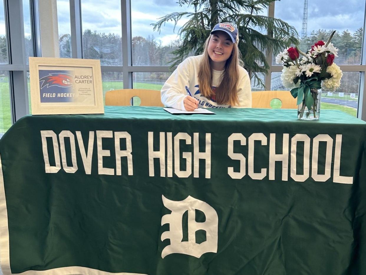Dover High School senior Audrey Carter recently signed her letter of commitment to play field hockey at the University of Massachusetts-Lowell.