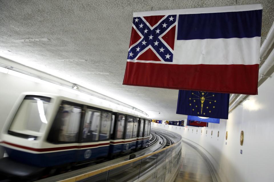 The Mississippi state flag, which incorporates the Confederate battle flag, hangs with other state flags in the subway system under the U.S. Capitol in Washington on June 23, 2015. (Jonathan Ernst/Reuters)