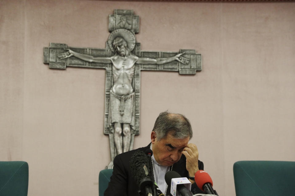 FILE — Cardinal Angelo Becciu talks to journalists during a press conference in Rome, Sept. 25, 2020. A Vatican trial into a money-losing investment has been jolted by revelations that a key prosecution witness was apparently manipulated into changing his story and cooperating with prosecutors. (AP Photo/Gregorio Borgia, File)