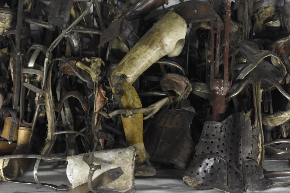 Artificial limbs are displayed former German Nazi concentration and extermination camp Auschwitz in Oswiecim
