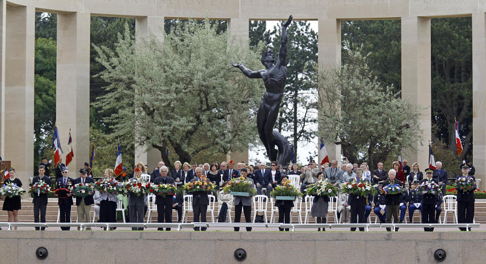 Wreathes are being laid at the Memorial of  the Colleville American military cemetery, in Colleville sur Mer, western France, Wednesday  June 6, 2012, during the ceremony commemorating the 68th anniversary of the D-Day.(AP Photo/Remy de la Mauviniere)