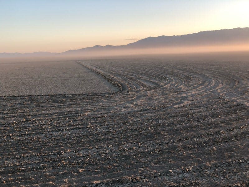 Tire tracks can be seen in mid-July 2020 on the Black Rock Desert as part of a message that currently is inscribed in the playa crust, reading "Black Lives Matter."