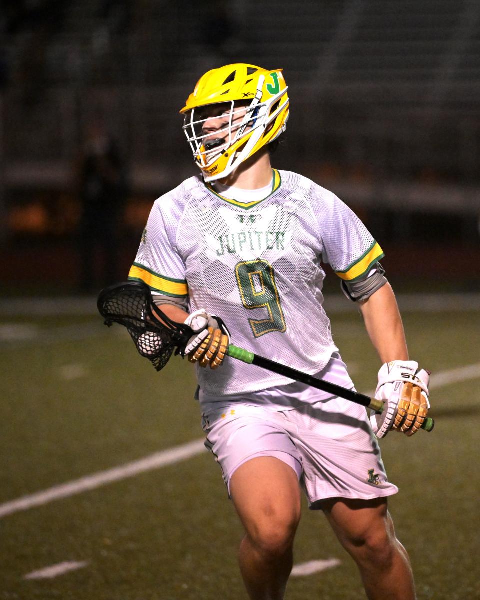 Jupiter's Dylan Furshman comes off the field following a faceoff during a regular season game against Oxbridge Academy on Mar. 26, 2024.