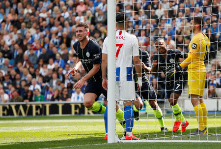 Soccer Football - Premier League - Brighton & Hove Albion v Manchester City - The American Express Community Stadium, Brighton, Britain - May 12, 2019 Manchester City's Aymeric Laporte celebrates scoring their second goal Action Images via Reuters/John Sibley