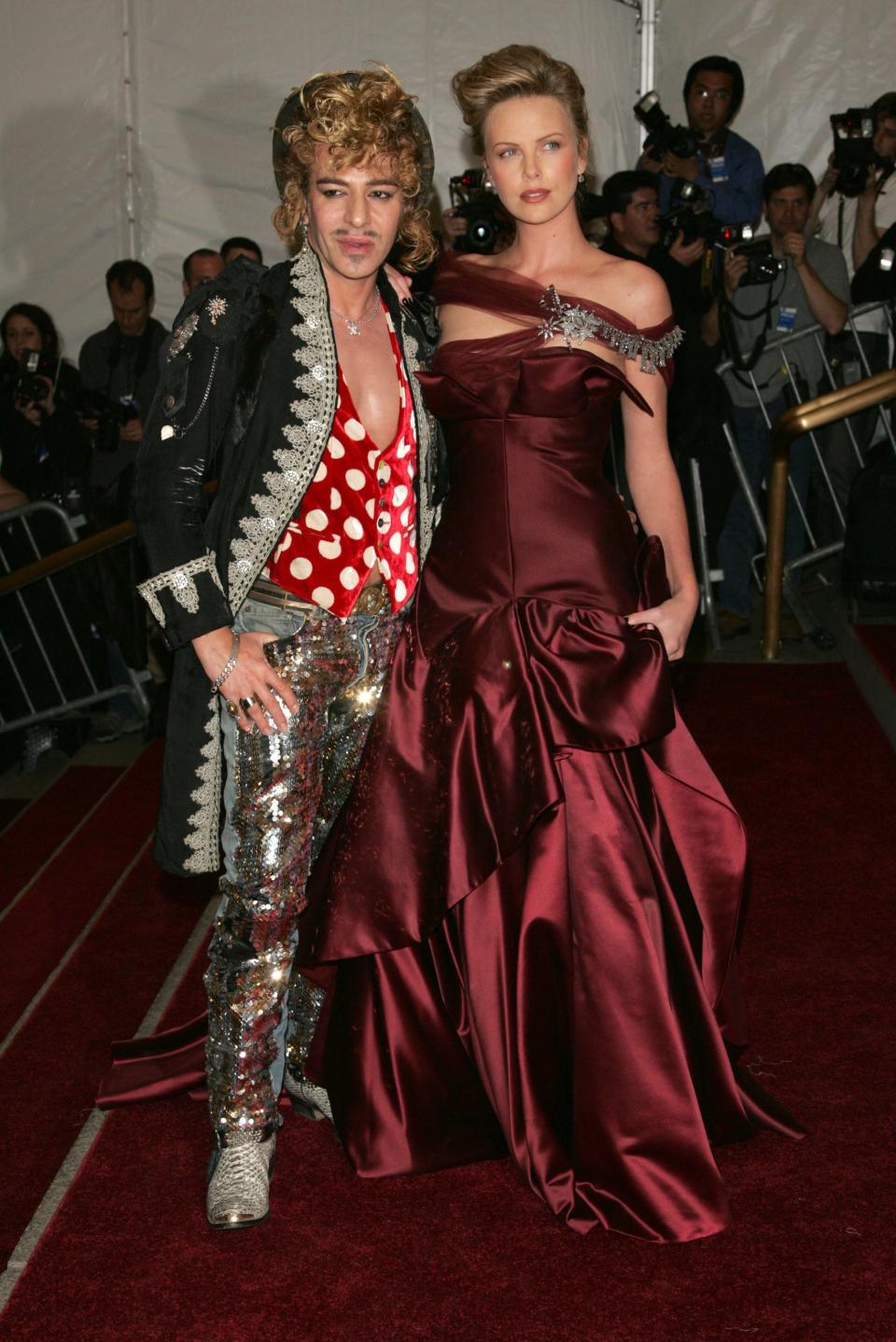 Charlize Theron and John Galliano