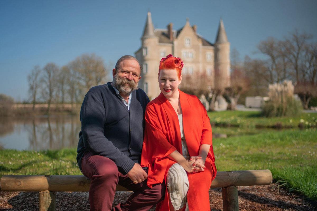 Dick and Angel Strawbridge outside their chateau (PA)