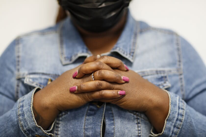 Los Angeles, CA, Monday, May 16, 2022 - Un unidentified person who alleges she was sexually assaulted as children at the former MacLaren Children's Center in Pasadena. The person is photographed at their attorney's office. (Robert Gauthier/Los Angeles Times)