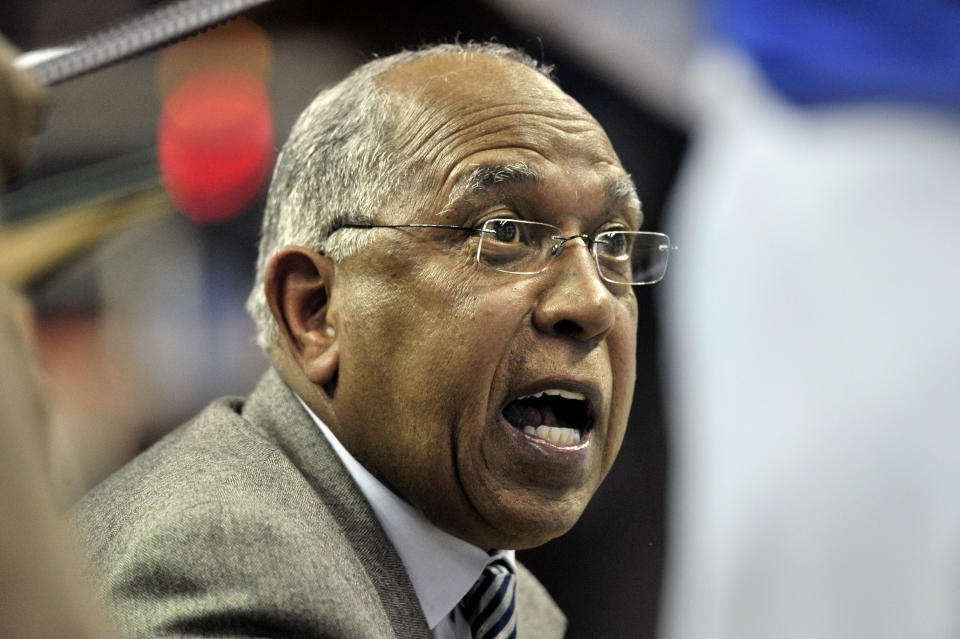 Memphis coach Tubby Smith talks to players during a timeout in the first half of an NCAA college basketball game against Wichita State on Tuesday, Feb. 6, 2018, in Memphis, Tenn. (AP Photo/Brandon Dill)