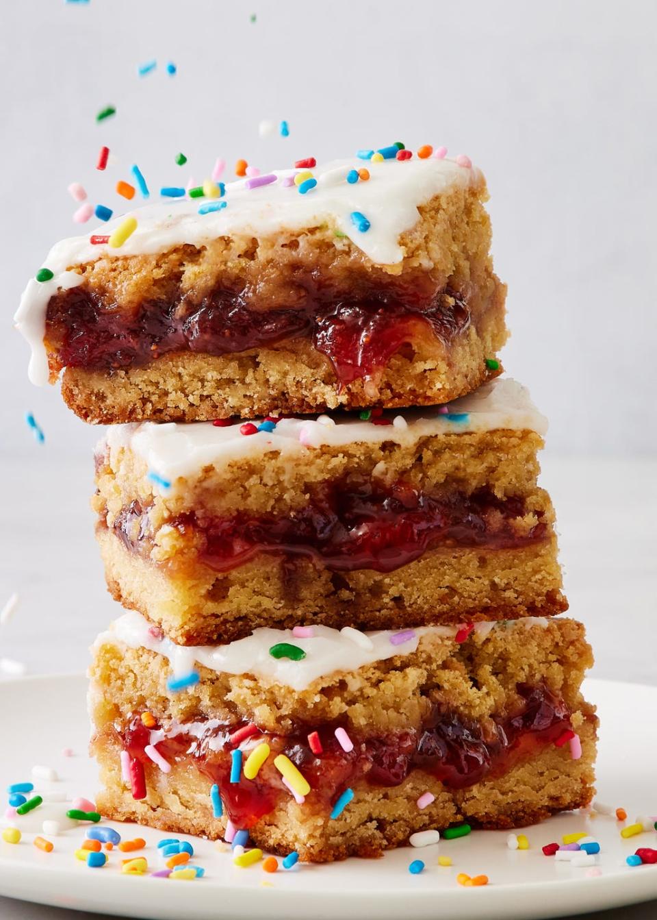 strawberry pop tart blondies with icing and sprinkles