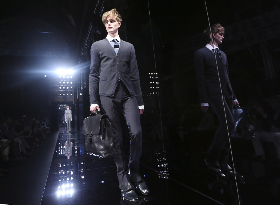 A model wears a creation of the John Varvatos men's Spring-Summer 2014 collection, part of the Milan Fashion Week, unveiled in Milan, Italy, Saturday, June 22, 2013. (AP Photo/Luca Bruno)