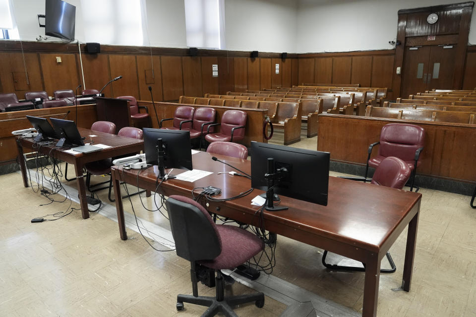 Judge Juan Merchan's Manhattan courtroom sits empty between proceedings, Tuesday, March 12, 2024, in New York. A dozen Manhattan residents are soon to become the first Americans ever to sit in judgment of a former president charged with a crime. Jury selection is set to start Monday in former President Donald Trump's hush-money trial. (AP Photo/Seth Wenig)