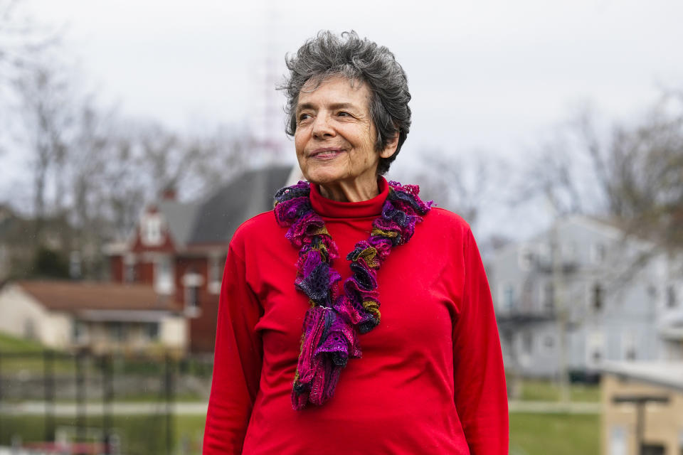 Ruth Kohake poses for a portrait outside of the Price Hill Public Library, Thursday, March 23, 2023, in Cincinnati. Kohake is among those caught up in the confusion over Ohio's strict new photo ID requirement. The retired nurse from Cincinnati gave up her driver’s license and her car in 2019. Now 82, she thought she might never have to step foot in another state license agency. (AP Photo/Jeff Dean)