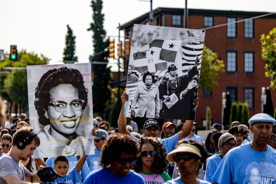 A group marches Saturday during an observance of the 65th anniversary of the Oklahoma City civil rights movement.