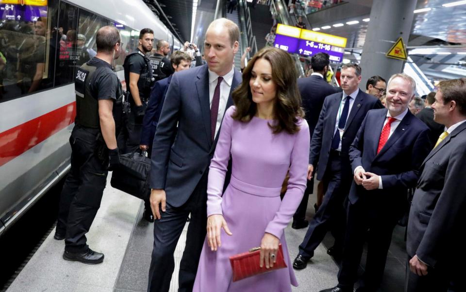 The Duke and Duchess of Cambridge prepare to board a train in Berlin for Hamburg - Credit: Kay Nietfeld/AP