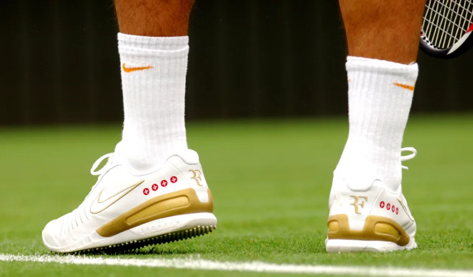 Roger Federer shoes Nike RF logo Credit: Alamy