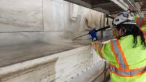 In this photo provided by National Park Service, architectural conservators apply steam to the Jefferson Memorial as part of the GAOA-funded cleaning of the memorial in Washington. The Great American Outdoor Act was passed by Congress last year and dedicated up to $1.6 billion a year for the next five years to extensive maintenance and repairs that have been put off year after year. (National Park Service via AP)